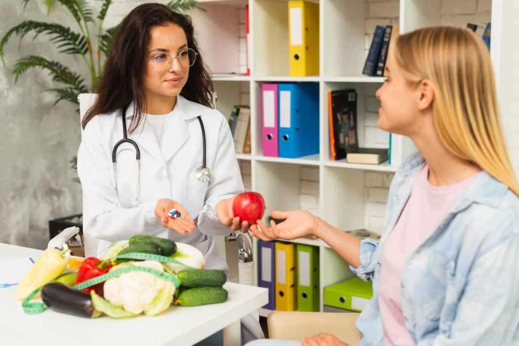 Doctor providing nutrition counseling and healthy lifestyle guidance to a patient