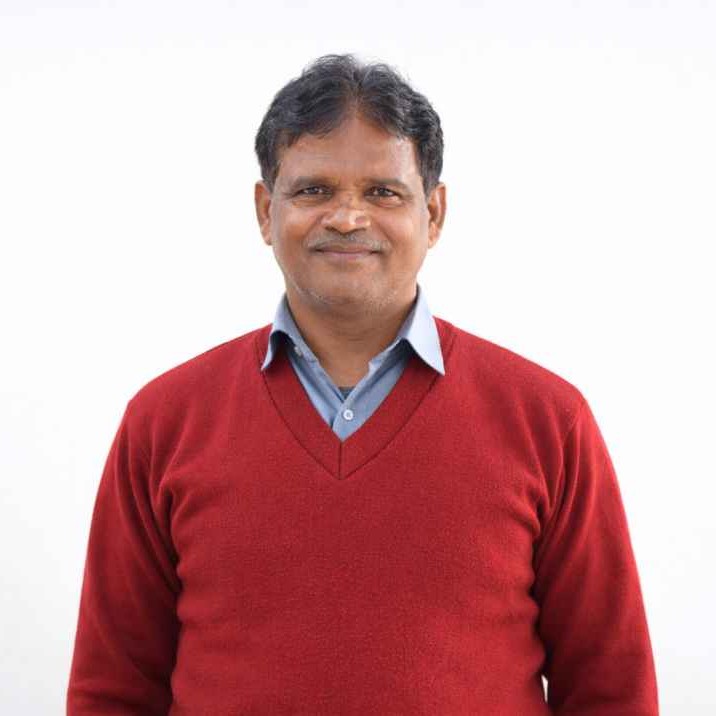 Indian male in red sweater