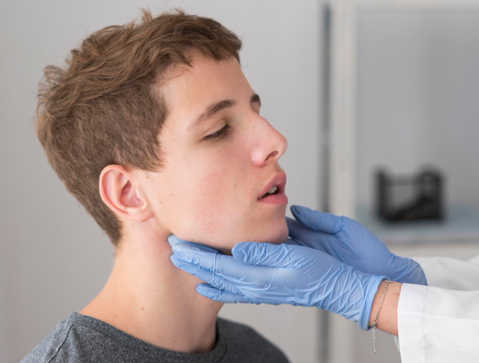 A healthcare professional evaluates a patient’s facial structure and expressions prior to a medical or cosmetic intervention. The image represents careful pre-procedure assessment, patient safety, and clinical precision in facial treatments.