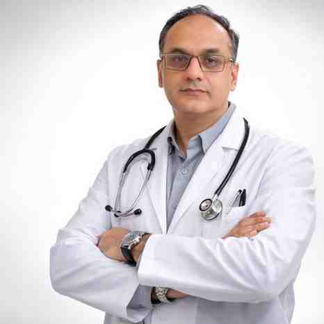 An Indian Doctor in white Apron