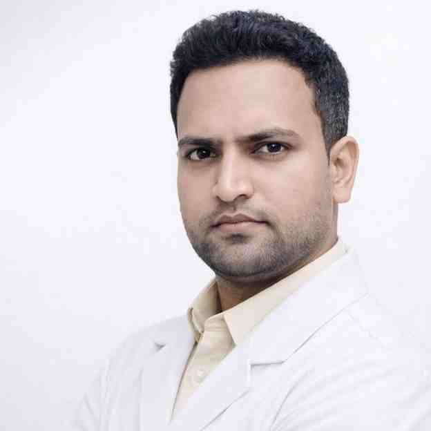 Indian Doctor in White Apron