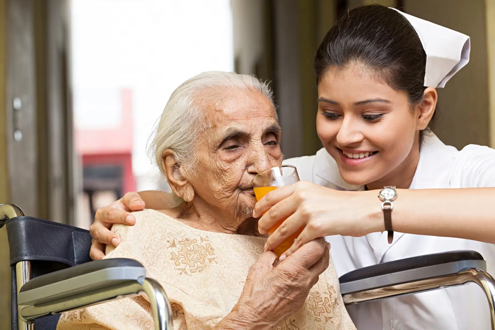 Professional nurse providing healthcare services to patient at home from Nishat Hospital