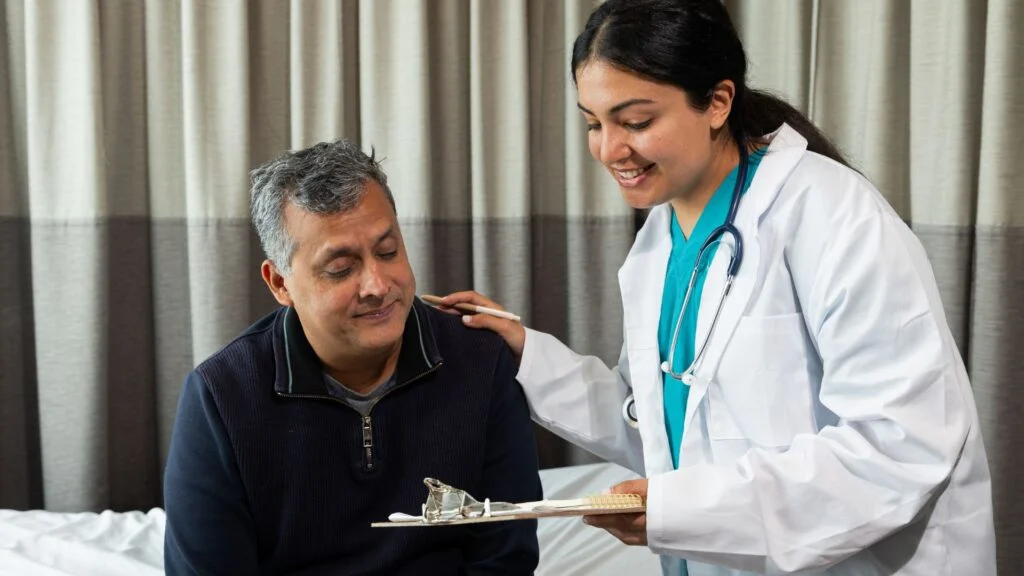 Doctor consulting patient during general healthcare checkup at Nishat Hospital